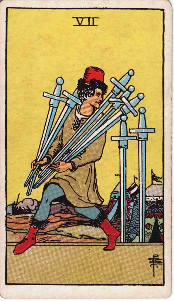 a tarot card with a man holding a sword and a sword